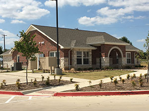 A photo of the community building at Bishop Gardens in Justin Texas